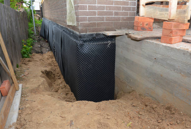 SJ Waterproofing Pros technician performing targeted Vapor Barrier Installation assessment in Houston, PA